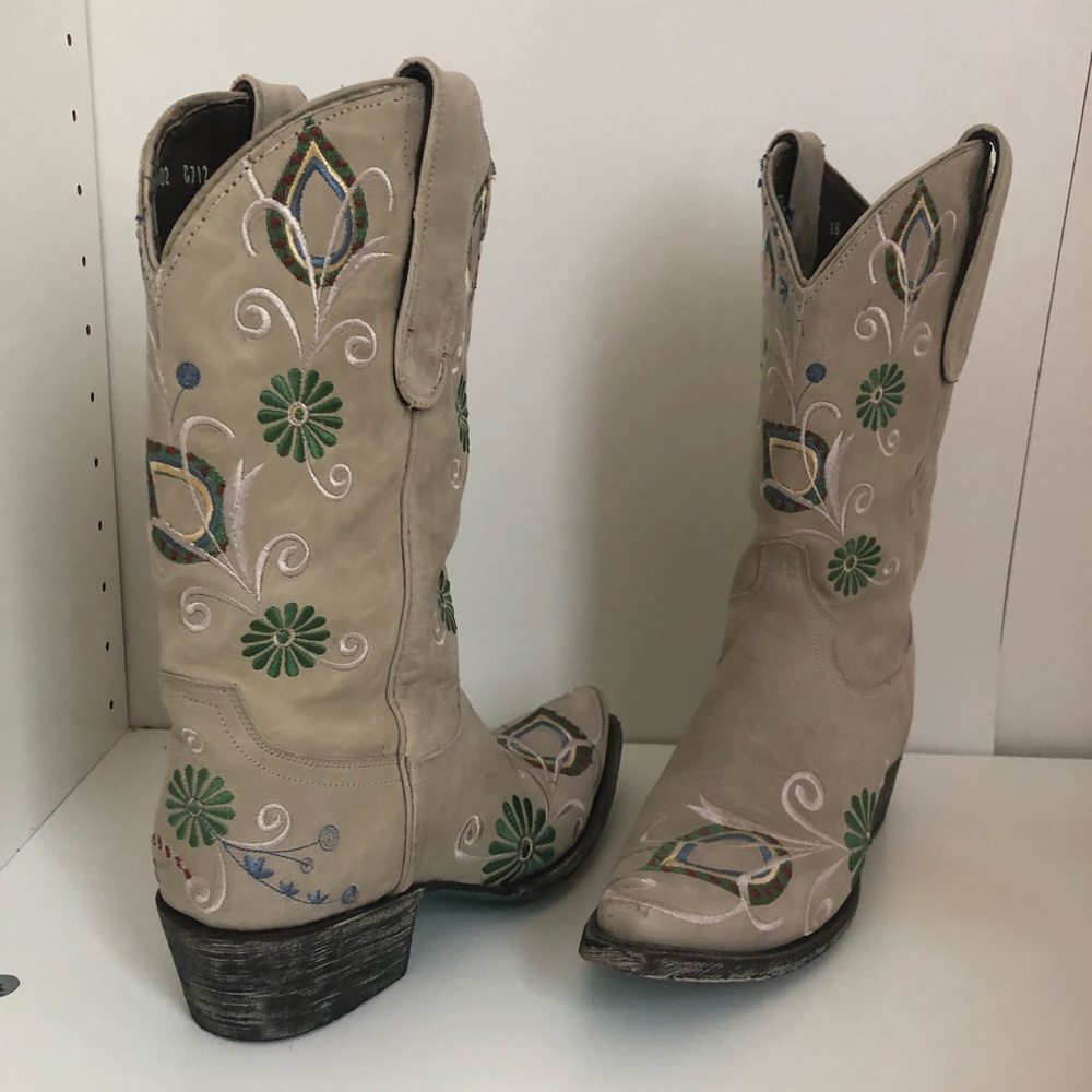 Leather bottom cowboy boots with 2 inch heel